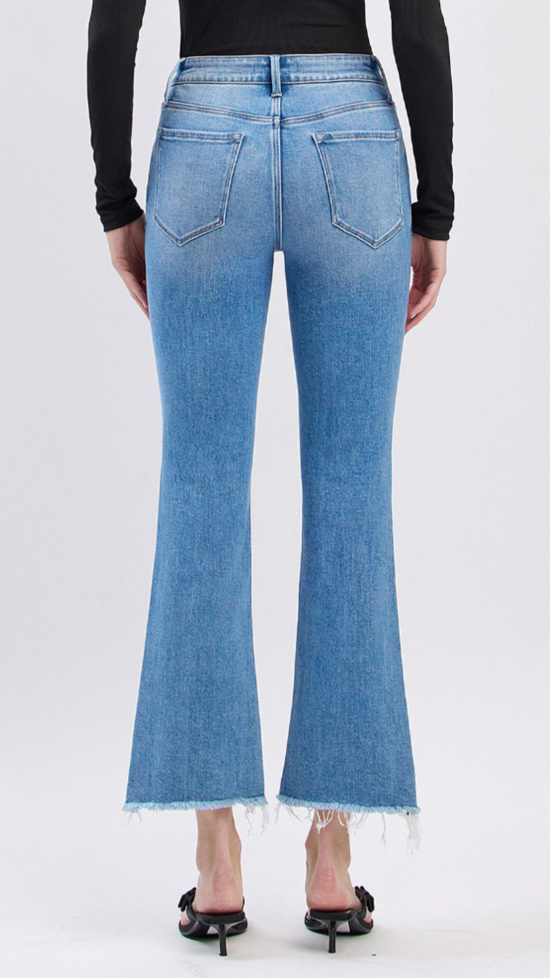 High Rise Medium Wash Slant Raw Hem Crop Flare Jeans