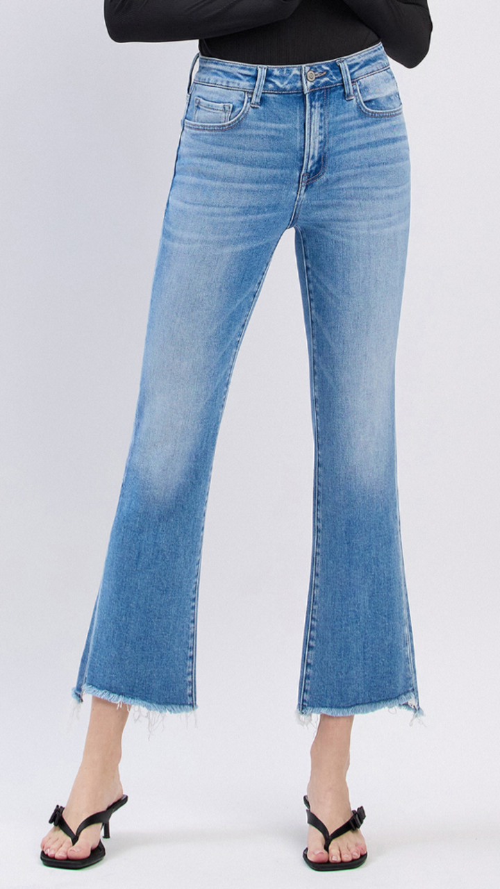 High Rise Medium Wash Slant Raw Hem Crop Flare Jeans